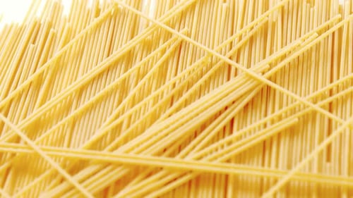 Close Up of Dried Spaghetti Pasta on White