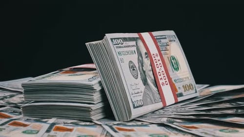 Stacks of US Hundred Dollar Bills Close Up