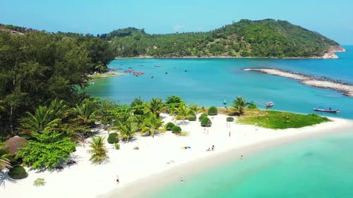 Vibrant colors of the tropical island coast. White sand beaches, exotic vegetation and turquoise sea