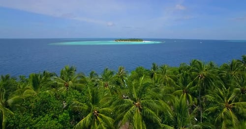 Aerial drone view of scenic tropical islands in the Maldives.