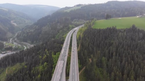 Aerial View of the Highway Viaduct on Concrete Pillars in the Mountains