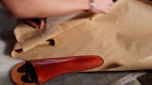 Leather Craftsman Wrapping Leather Book with Brown Paper