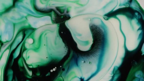 Swirling Green, Blue and White Liquid Abstract