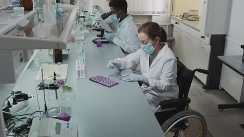Scientists Working in Modern Medical Research Laboratory