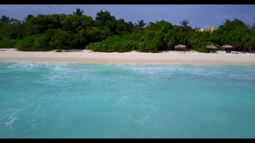 Aerial travel of perfect lagoon beach break by turquoise water and white sandy background of a dayou