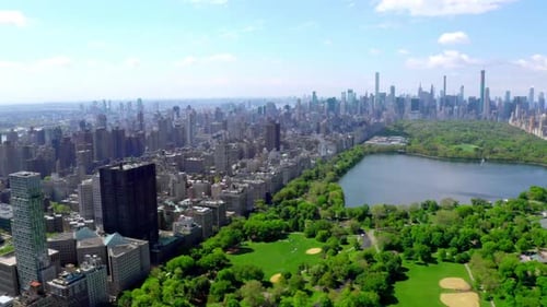 Aerial Video Above Green Central Park in the Middle of Manhattan New York
