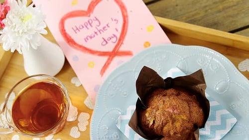 Birthday Muffin and Card on Decorated Table