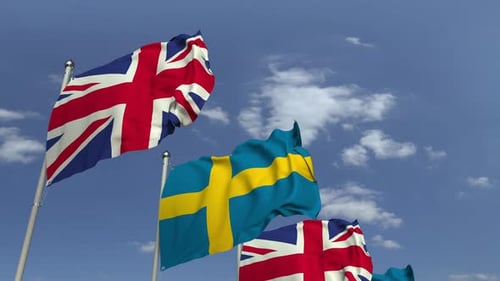 Waving National Flags of Sweden and the United Kingdom