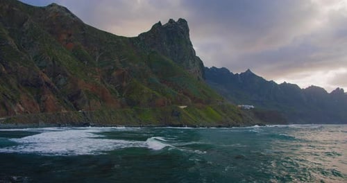 Slow Motion Video Footage of Peaceful Calm Dark Blue Ocean Water Surface Cloudy Sunset or Sunrise