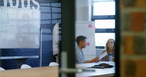 Diverse Business Team Meeting in Modern Office