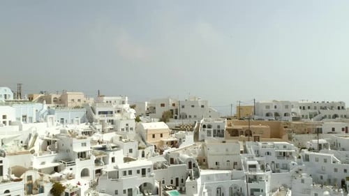 Aerial view of traditional white houses on Santorini island, Greece.