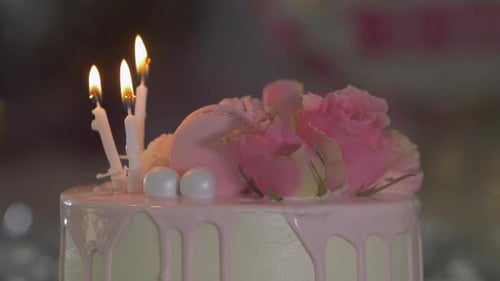 Beautiful Cake Decorated with Roses and Candles