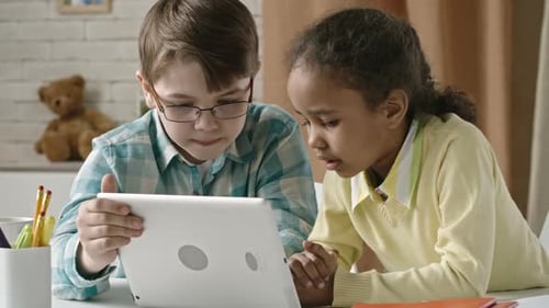 Schoolchildren Working with Tablet