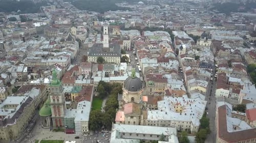 The Historic Old City of Lviv in Autumn, Drone Shooting From Above. Roofs of Houses and Churches in
