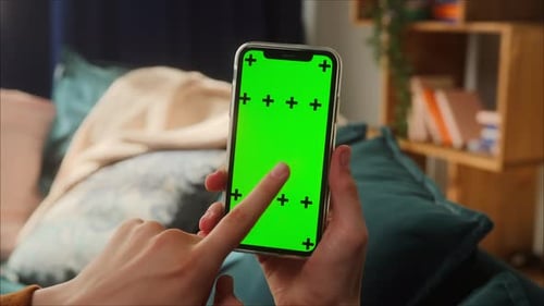 Closeup of Smartphone with Green Screen Young Man Hands Holding Mobile Phone Isolate Display Touch