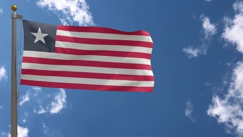 Realistic Liberian Flag Waving on Flagpole with Blue Sky