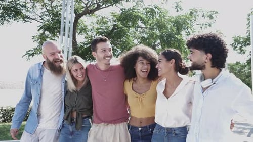 Group of Diverse Friends Laughing Together Outdoors