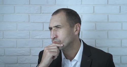 Man think about strategy on business.