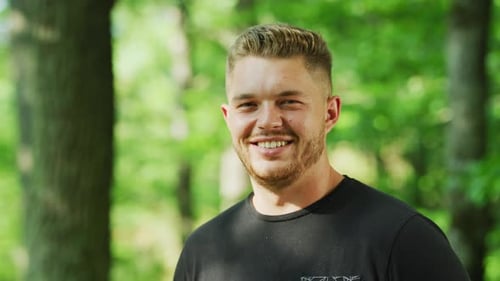 Smiling Man Portrait in Forest