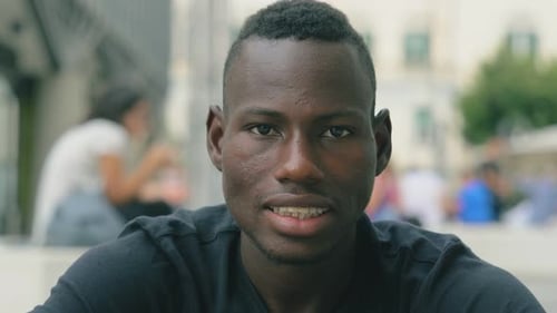 Young Man Close Up Portrait in City