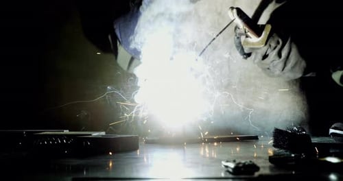 Welder welding a metal