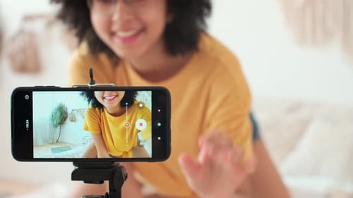 Teen Girl Vlogging Guitar Tutorial on Phone