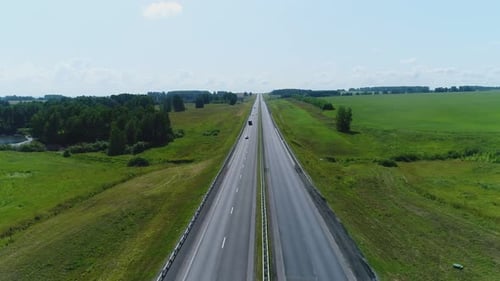 Aerial View Trucks Driving Along the Highway