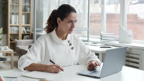 Businesswoman Working in Office