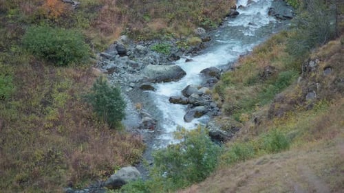 Mountain river flowing through the rocks