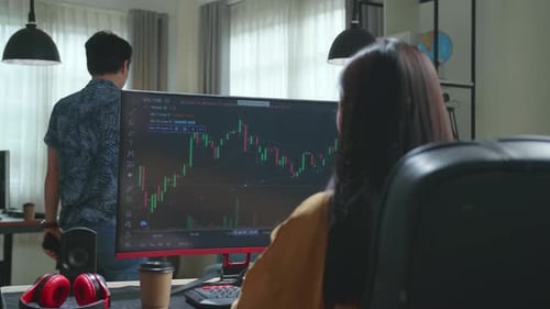 Young Businesswoman Or Trader Using Desktop Computer While Sitting In His Office