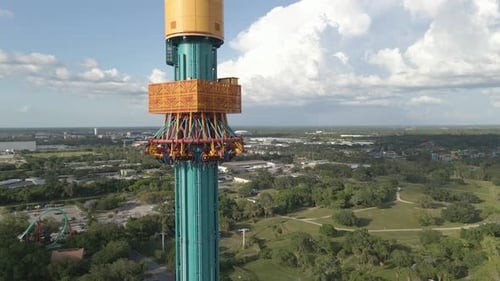 People riding Free fall tower in theme amusement park, Busch Gardens, Tampa Florida