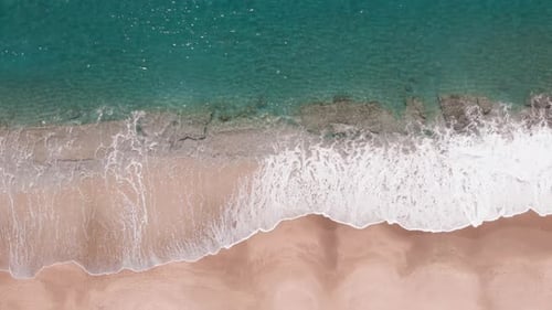 Incredible view of ocean waves crashing on sand beach