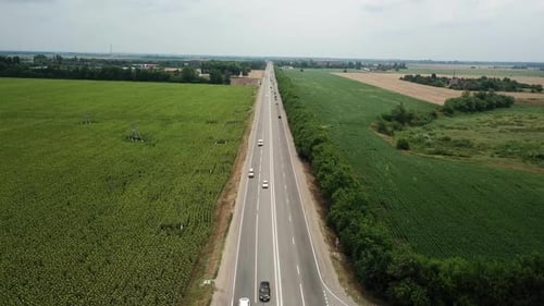 Aerial Fly Over Motorway, Freeway Traffic - Trucks and Cars on the Road