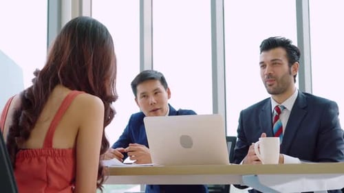 Business Meeting with Colleagues in Bright Office