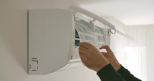 Air Conditioner Filter Replacement in Home Environment