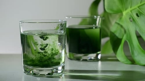 Liquid chlorophyll in a glass of water