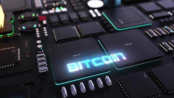 bitcoin header on the background of microprocessors on a circuit board ...