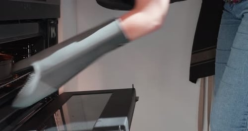 Baking a Cake in the Kitchen Oven