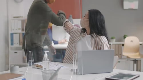 Employees Work Safely in Modern Office