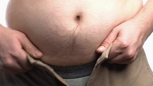 Fat Men Body Trying To Put on He Shorts