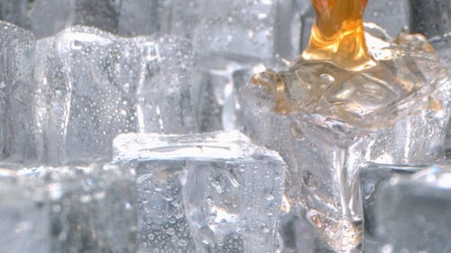 Whisky Pouring on Ice