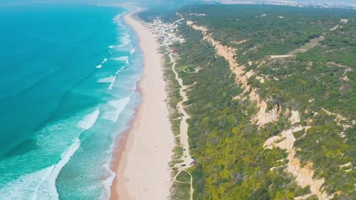 Flight Over the Sandy Beach and Waves