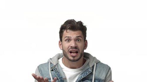 Man Reacts with Shock and Surprise