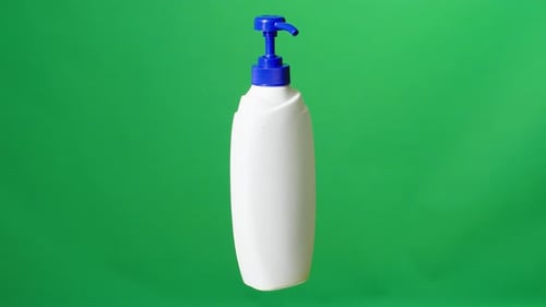 Cosmetic Bottle, Shampoo Dispenser Product Package, Shaver Foam On Green Screen Background