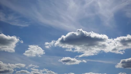 Time Lapse of Fluffy Clouds in a Blue Sky