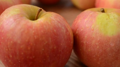 Fresh Apples on Wooden Surface Close Up