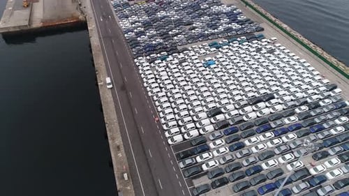Aerial View of New Car Parking Lot by Docks