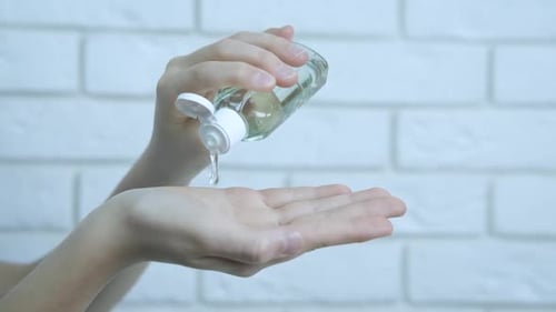 Hand Sanitizer Applied to Hands