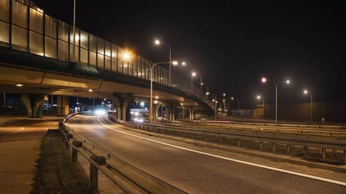 Timelapse Car Traffic Road Junction Highway in Big City at Night