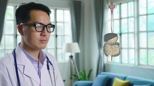 Doctor Interacting with Hologram of Human Internal Organs